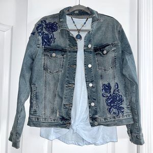 Blank NYC Women’s denim jacket with floral embroidery.